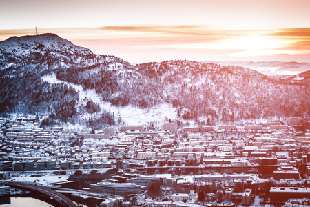 Panoramic view from the mountains to Bergen in winter, ccity in the haze, Norwayの写真素材