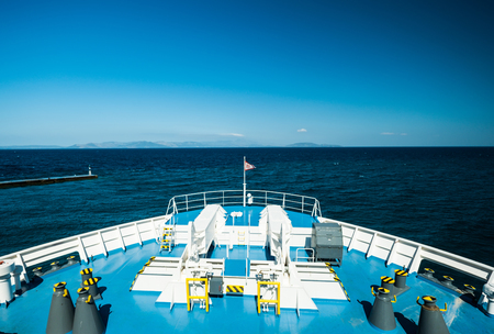 Ship deck with blue floor in ocean, view from aboveの写真素材
