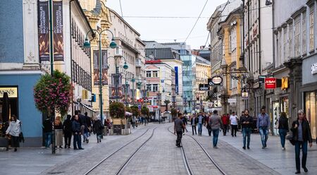 Linz, Austria - 22 September 2018: People walking at the city street