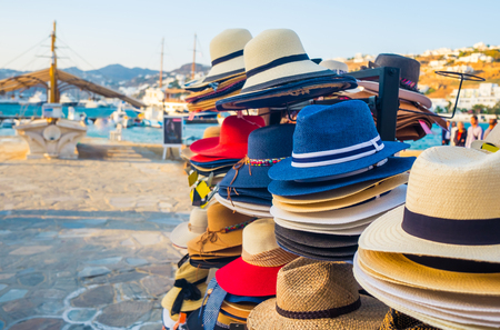 Wicker hats on the stand with pierの写真素材