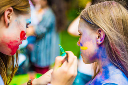 Khakiv, Ukraine - 19 May 2018: Faceart in Gorky Park at holi festivalのeditorial素材
