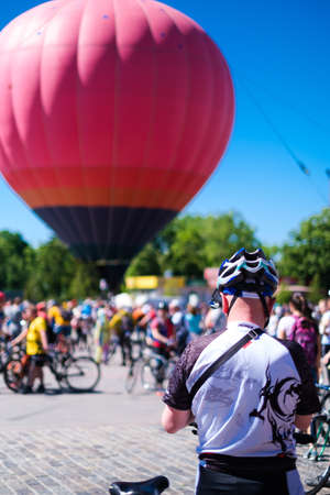Kharkiv, Ukraine - 19 May 2019: Big baloon in the center of the city and bycyclists at cyclist dayのeditorial素材