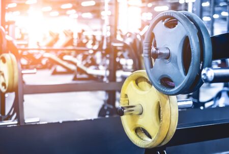 rack with differen weights in light modern gymの写真素材