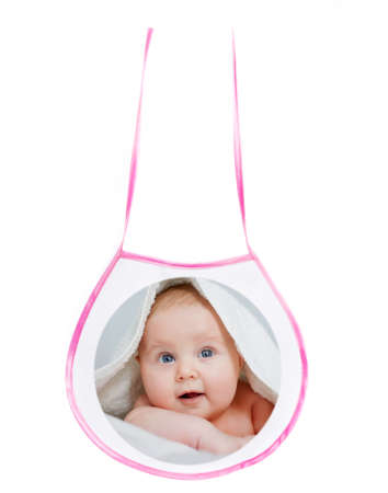 Cute bib for baby feeding with personal print isolated on white backgroundの写真素材