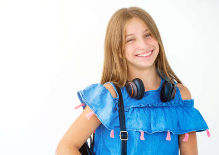 Smiling teenager isolated on white backgroundの写真素材