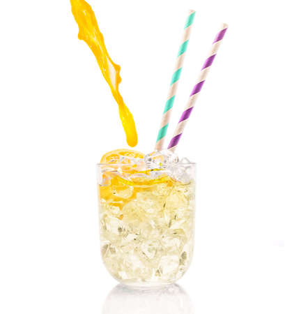Beautiful icy cocktail with colorful strawsの写真素材