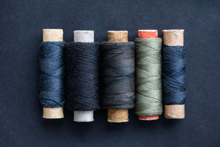 Close up view of spools set with retro threadsの写真素材