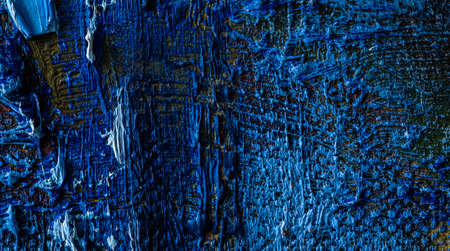 Textured background of canvas with blue painの写真素材