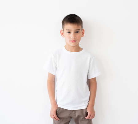Cute little boy wearing blank white t-shirtの写真素材