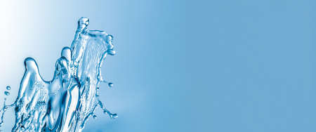 Water splashes with copy space, blue background