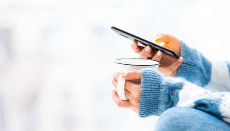 Cup and smartphone