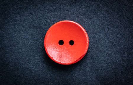 Red wooden sewing buttonの写真素材