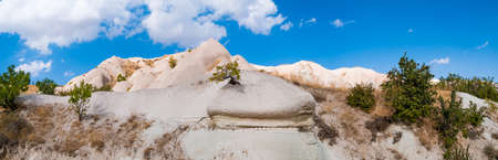 Sand mountain under clear blue skyの写真素材