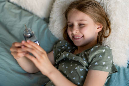 Portrait of preteen girl indoorsの写真素材