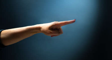 Hand shows signs with fingers
