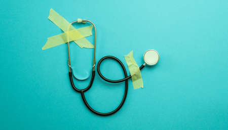 Stethoscope on blue backgroundの写真素材