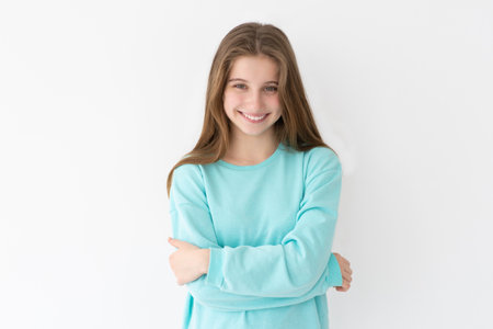 Smiling teenage girl with loose hairの写真素材