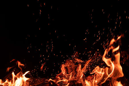 Campfire flame isolated on black backgroundの写真素材