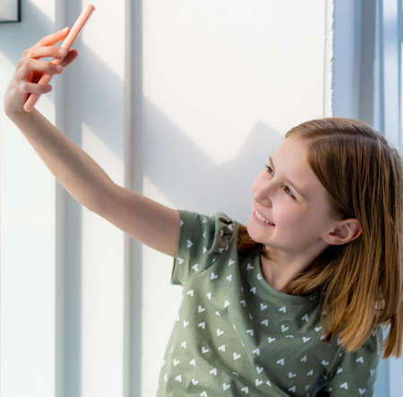 Preteen girl with smartphone
