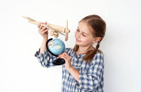 Little girl with globe