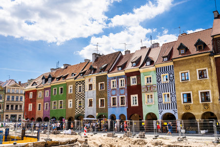 Poznan, Poland - 05 July 2022: Old Market (Stary Rynek) square with small colorful houses, tourists...