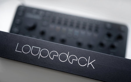Kyiv, Ukraine - 28 December 2021: Loupedeck Photo Editing Console and Lightroom Keyboard for Adobe...