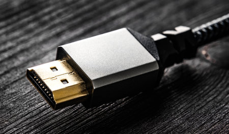 HDMI connector close up view on a dark tableの写真素材