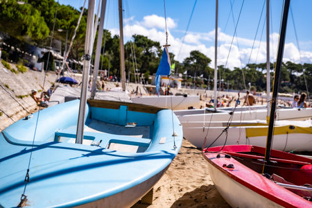 Fishing boats on beautiful sea beach in sunny day. Travel transportation on scenic seascape at summerの写真素材