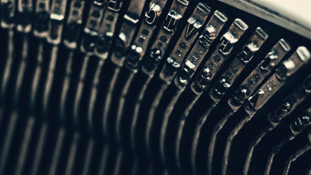 Letters and numbers on typo keys of an old manual typewriter on a retro writing machine, close up viewの写真素材