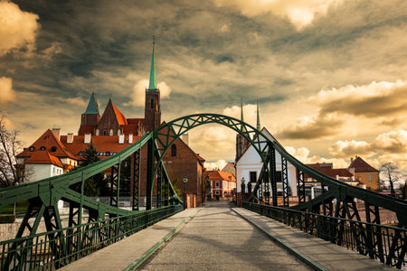 Old Footbridge Over The Oder River In Wroclaw at sunsetの写真素材
