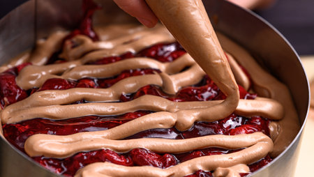 cooking homemade strawberry pie with chocolate creamの写真素材