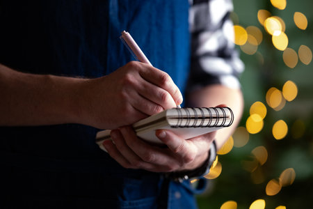 Waiter Writing An Order In A Notepad