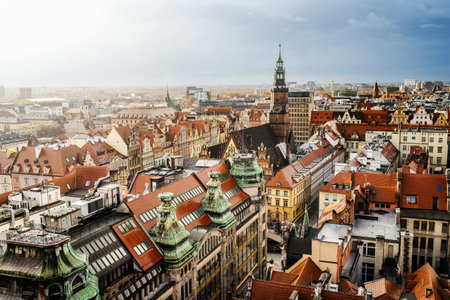 Medieval architecture of Wroclaw city in Poland, view from above to colourful roofs. Scenic old town in Europe.の写真素材