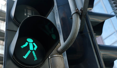Pedestrian traffic green light on a city crosswalkの写真素材