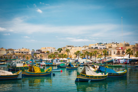 fishing boats near fishing village of Marsaxlokk (Marsascala) in Maltaの写真素材
