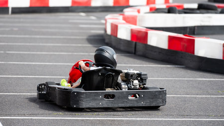 KidS Go-Kart Racing Track, Little Girl Drives Last Lapの写真素材