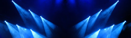 Blue Stage Light Illuminates The Concert Stage With Smoke During A Musical Performanceの写真素材