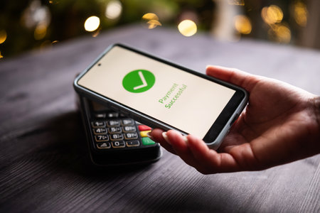 Payment Processing And Approved Status On A Smartphone Screen With Nfc Technology At A Christmas On...