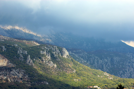 High rocky mountains, cloudy sky. Beautiful panoramic view of the mountainous terrain of Montenegroの写真素材