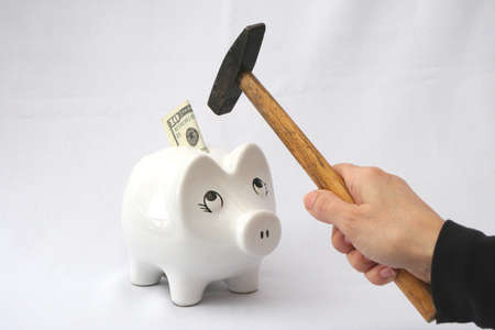 Pig safe box and hammerの写真素材