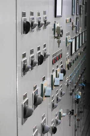Power plant control panel with switches and instruments