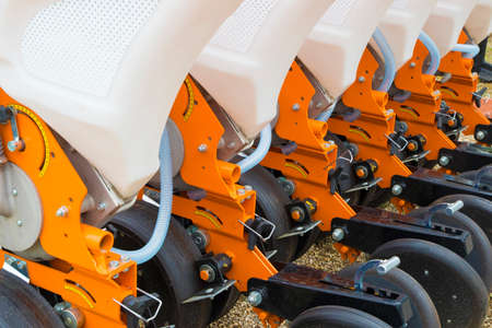 Orange seeder machinery for a Farming Tractorの写真素材