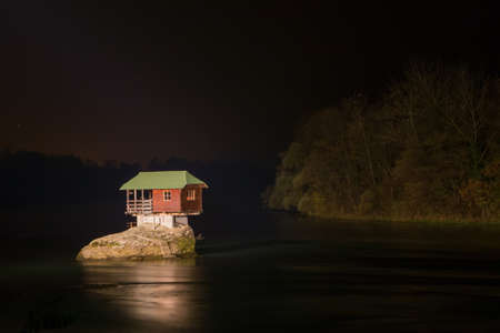 Night view of Lonely house on the river Drina in Bajina Basta in  Serbiaの写真素材