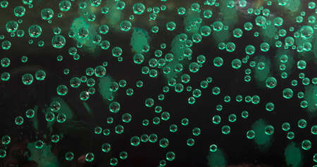 Group of green air  bubbles in water