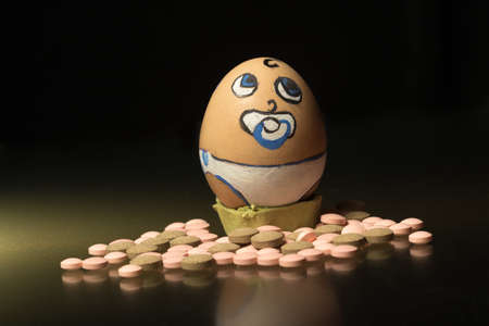 Birth control pills, lonely sad egg face