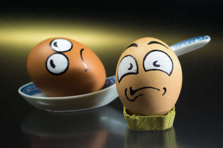 Two frightened egg faces waiting for cooking