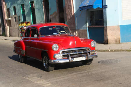 Shiny Red oldtimer car in Havana street, Cuba