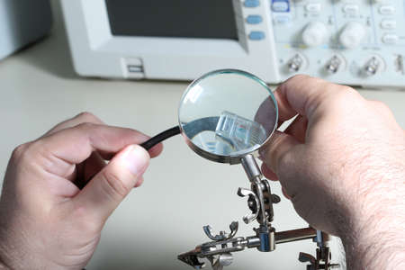 Lan connector and cable check in laboratoryの写真素材