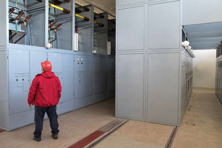 Engineer  control high voltage power switch in power plant