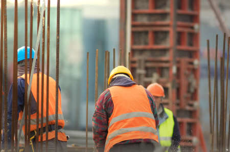 Armature and builders in orange at the reconstruction area